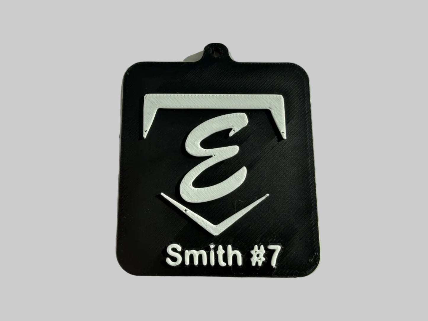 Custom key chain or back pack tag.